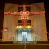 Giant red bow 2D Christmas decoration on Lisney estate agents building